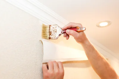 Pose de papier peint à la Malène — revêtements muraux et toiles de verre